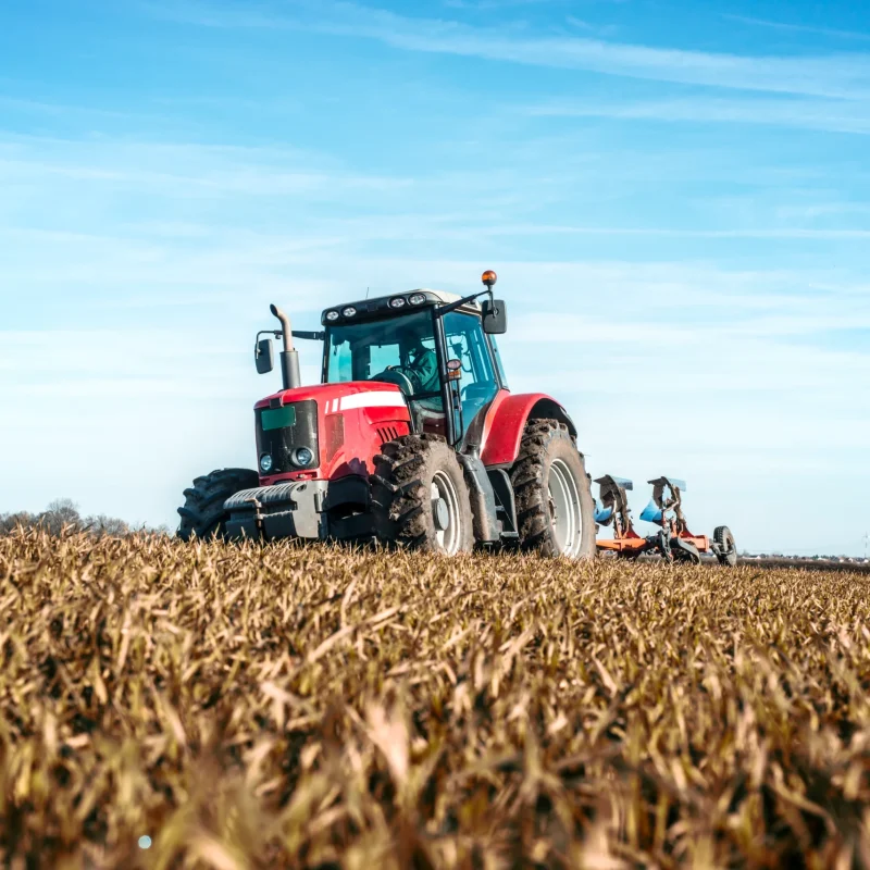 tractor-agricultural-machine-cultivating-field-optimized